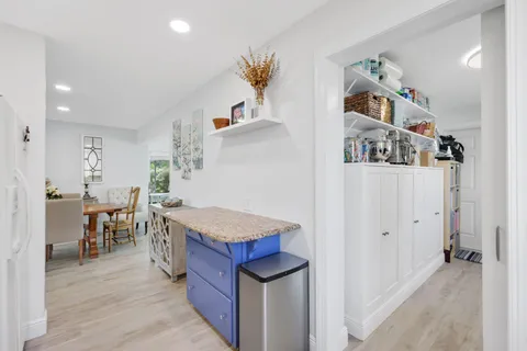 a very nice looking room with kitchen