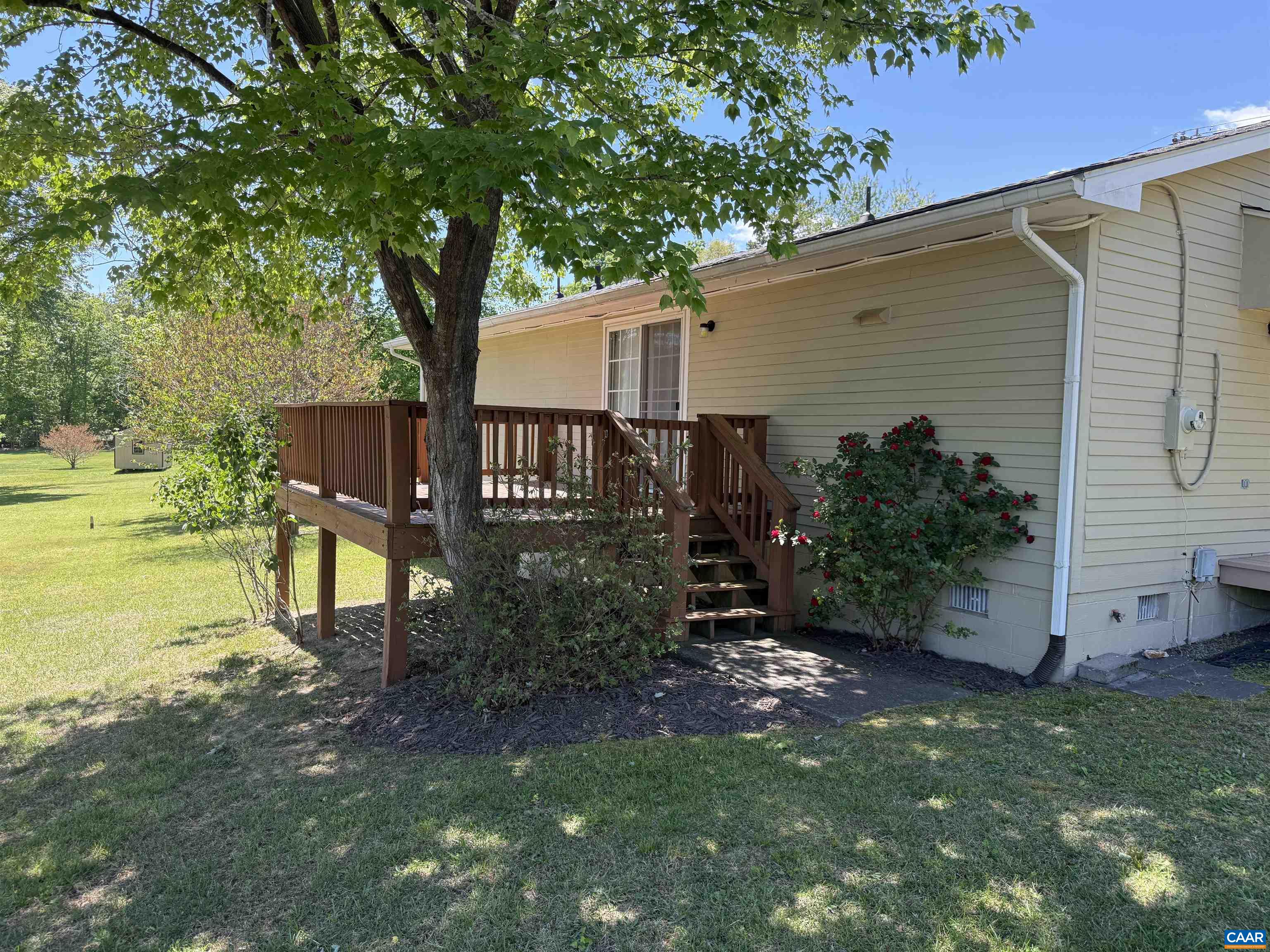 2002 Oliver Creek Road Troy, VA 22974 - Photo 24 of 38 a view of a house with backyard and sitting area