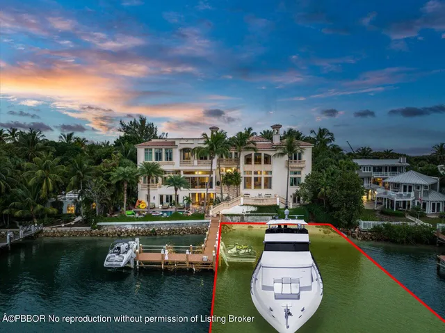 a swimming pool view with a outdoor seating