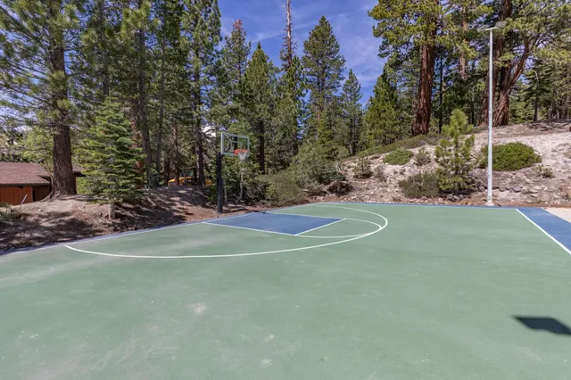 a view of a chairs and table in a patio
