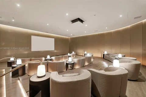 a kitchen with stainless steel appliances granite countertop a sink and a refrigerator