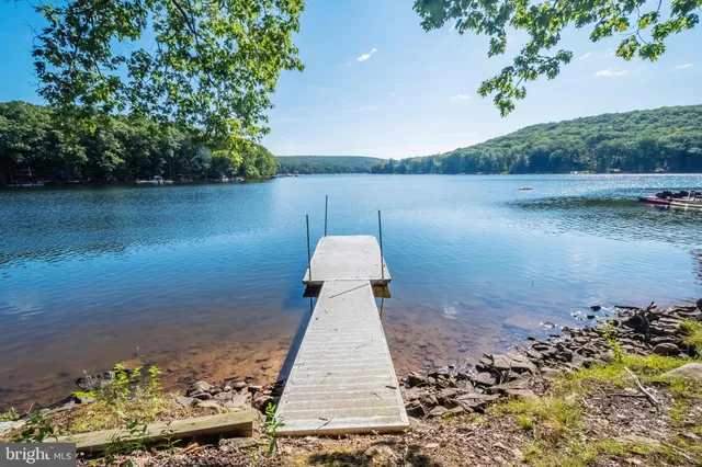 a view of a balcony with wooden floor