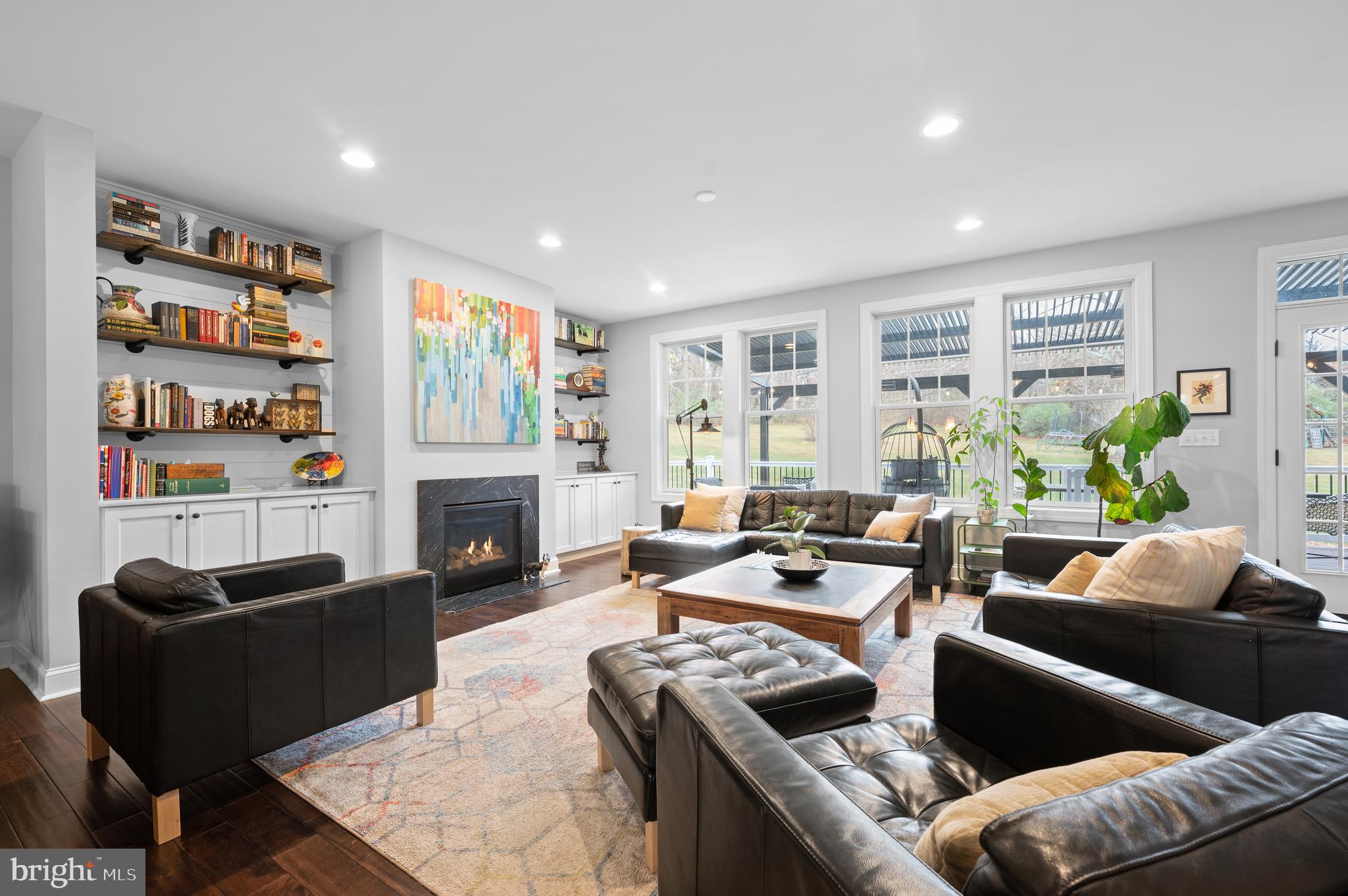 2700 Flowing Springs Road Spring City, PA 19475 - Photo 15 of 44 Gas fireplace and custom built-ins with shelving