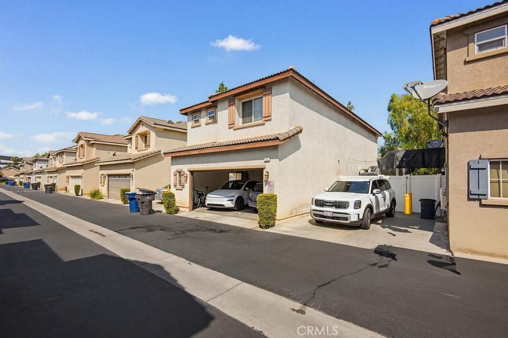 1747 Palermo Drive Riverside, CA 92507 - Photo 25 of 30 a view of car parked in front of house