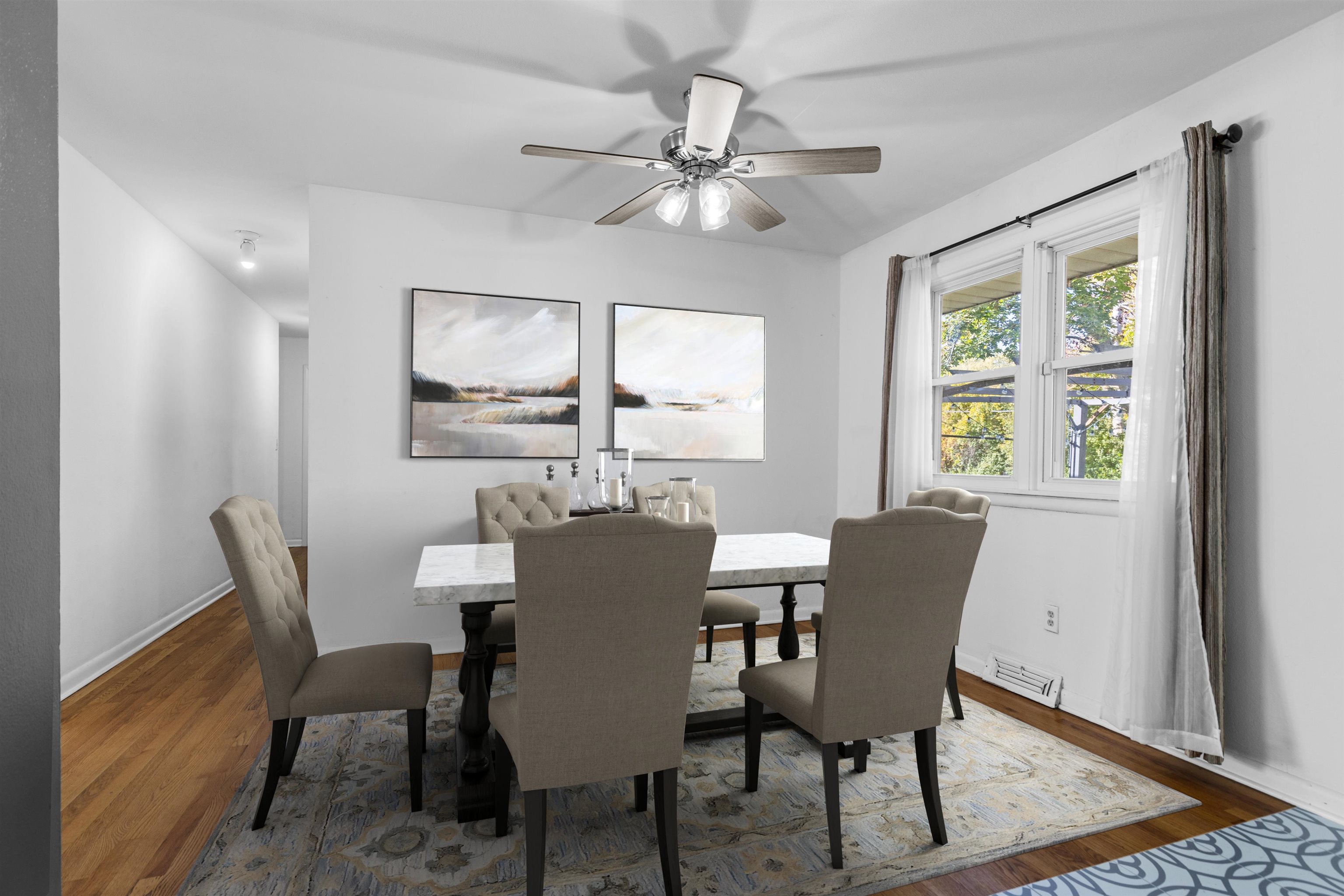 4012 Highcrest Road Rockford, IL 61107 - Photo 9 of 30 a view of a dining room with furniture window and wooden floor