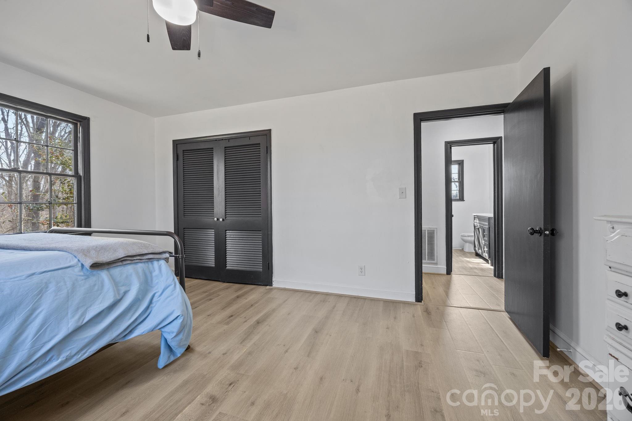 1352 City Lake Road Lexington, NC 27295 - Photo 13 of 36 a bed room with a bed and a window
