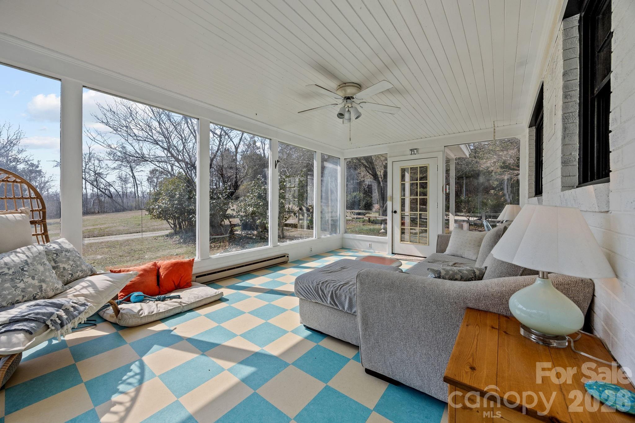 1352 City Lake Road Lexington, NC 27295 - Photo 19 of 36 a living room with furniture and a large window