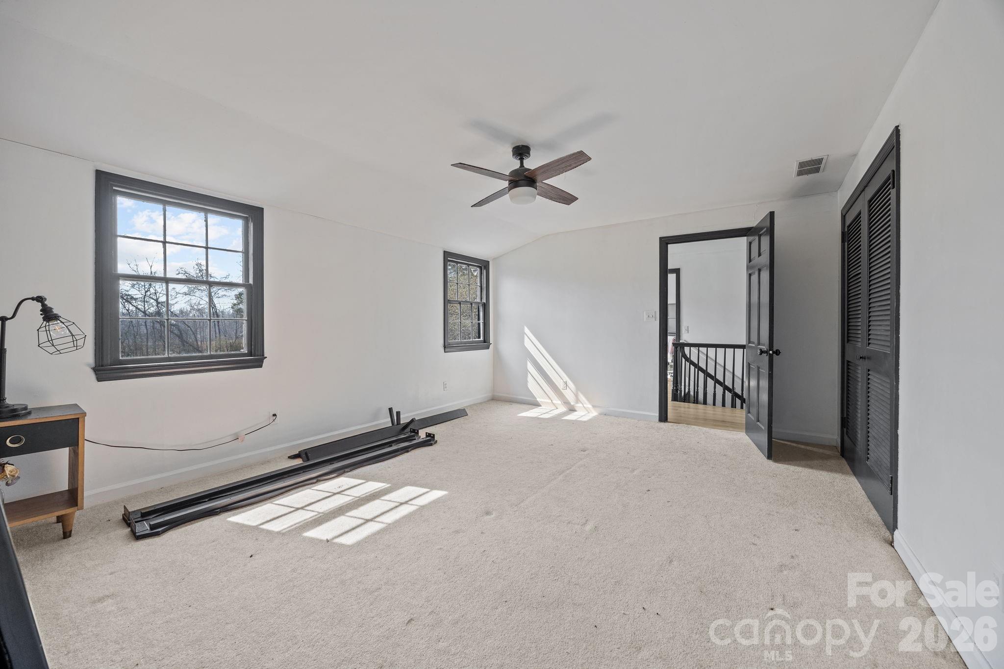 1352 City Lake Road Lexington, NC 27295 - Photo 24 of 36 a view of a livingroom with a ceiling fan and window