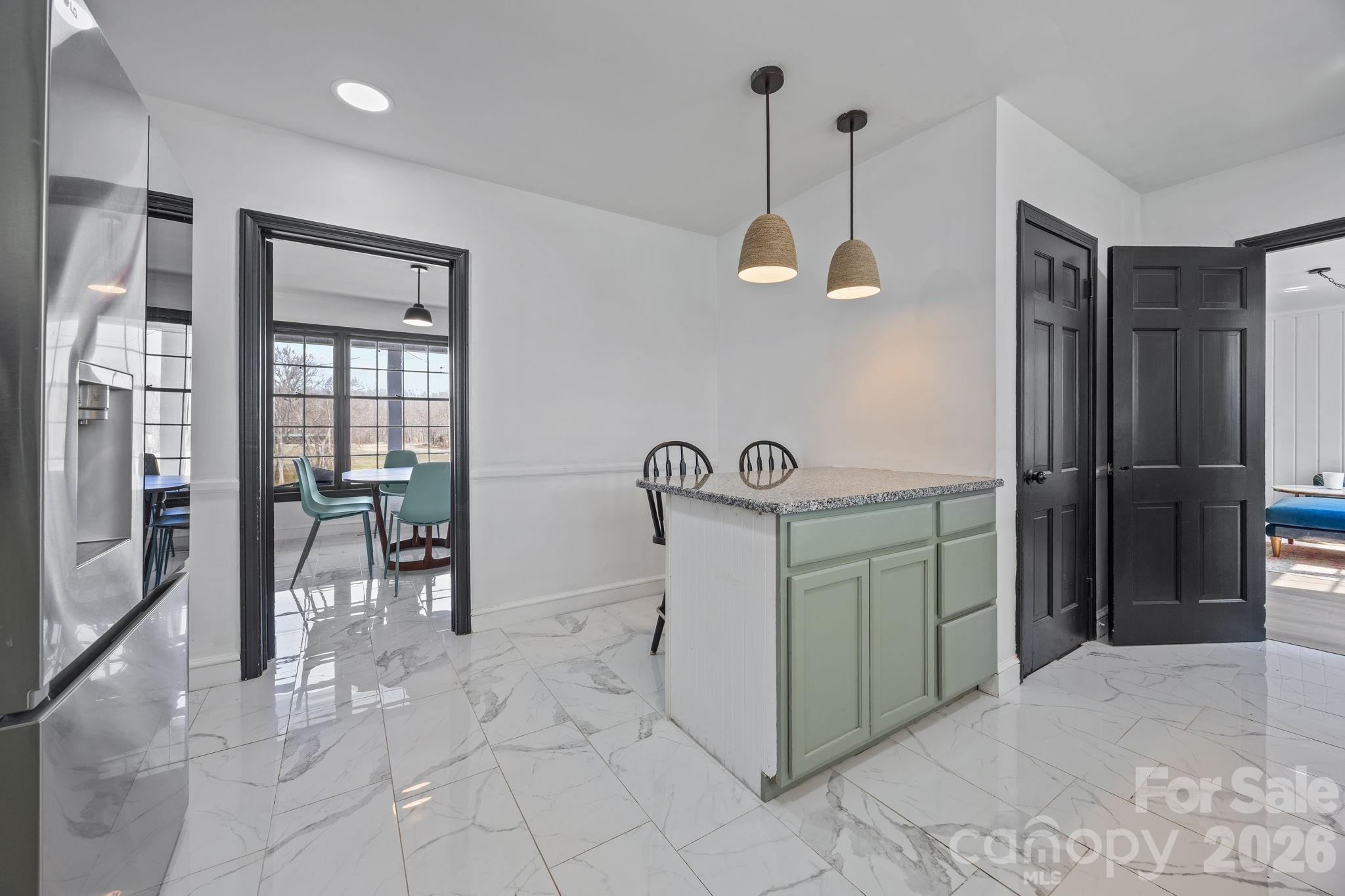 1352 City Lake Road Lexington, NC 27295 - Photo 3 of 36 a kitchen with stainless steel appliances granite countertop a refrigerator and a sink