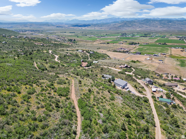 2459 Painter Road Marion, UT 84036 - Photo 32 of 42 Expansive elevated property featuring multiple building sites amidst natural shrubbery