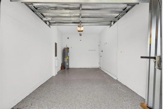 a view of a lake with couches and city view