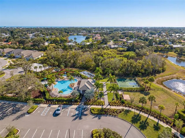 a swimming pool with outdoor seating