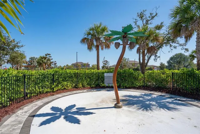 a view of a balcony with wooden floor and lake view