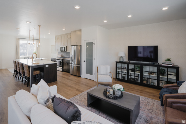 2012 West 1150 South, Unit 1018 Payson, UT 84651 - Photo 5 of 25 Living room featuring light wood-style flooring and recessed lighting