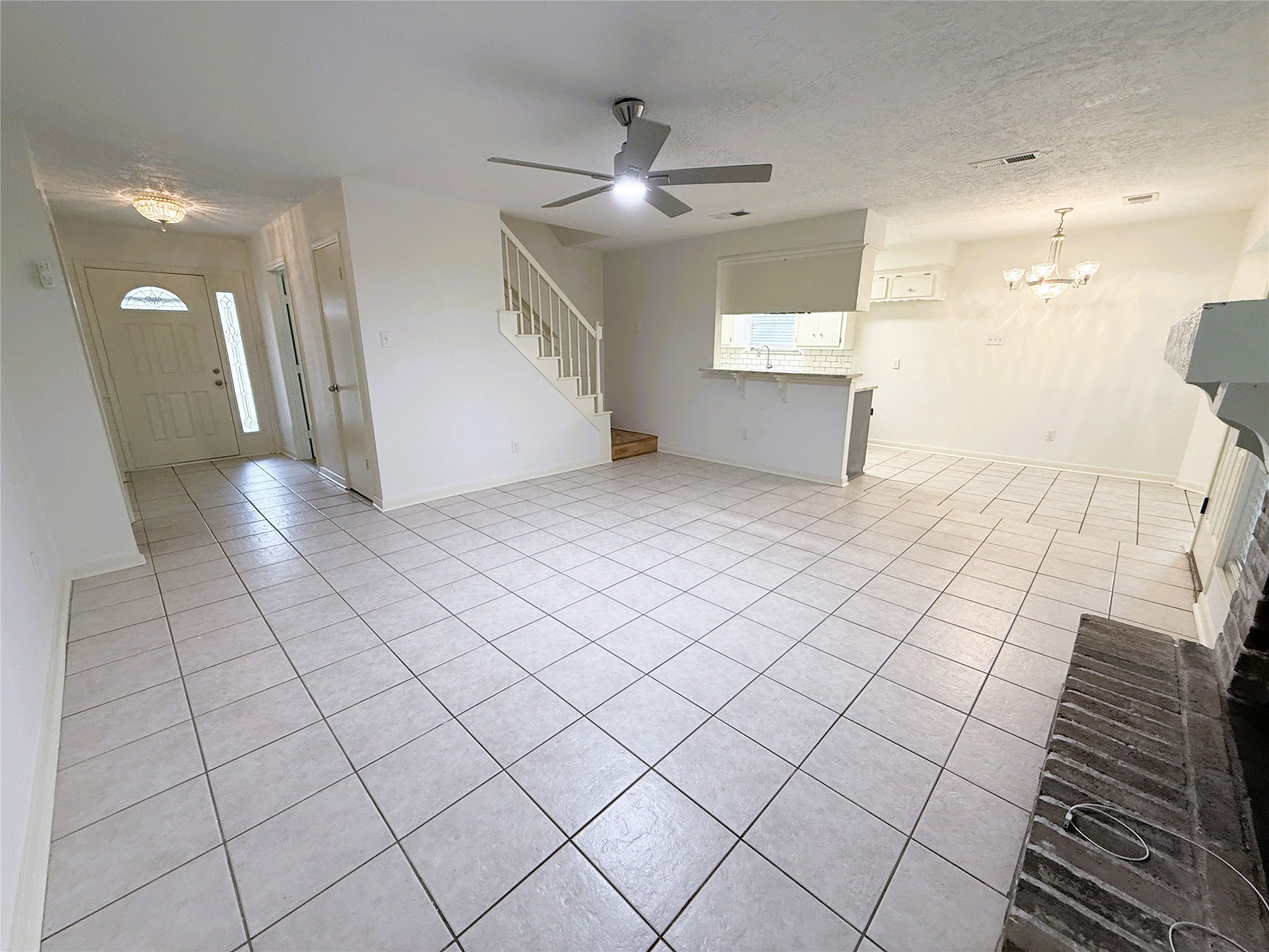 6902 Sandy Knolls Drive Spring, TX 77379 - Photo 13 of 30 living area and view of the entry way
