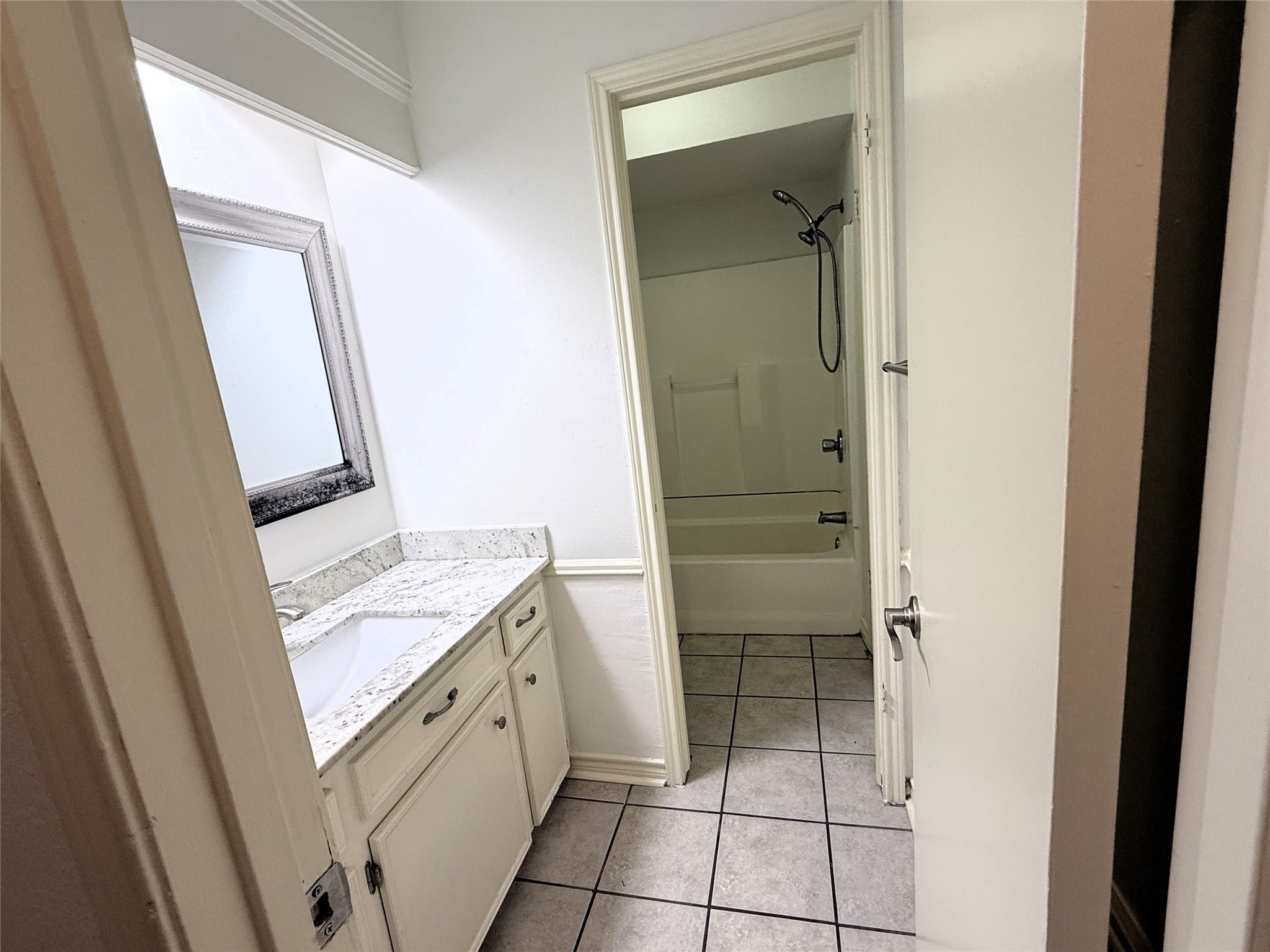 6902 Sandy Knolls Drive Spring, TX 77379 - Photo 7 of 30 downstairs bath showing the privacy door