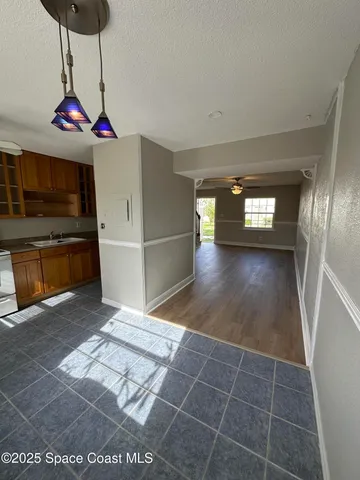 a view of livingroom with furniture wooden floor and window