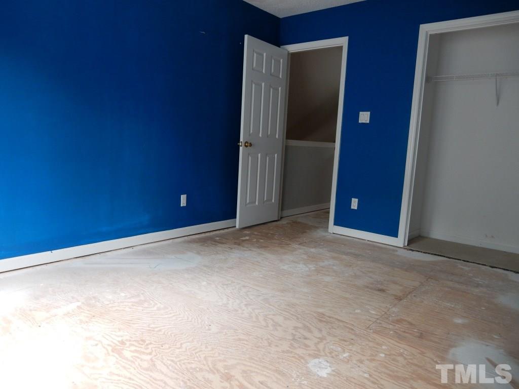 5313 Denmead Way Raleigh, NC 27613 - Photo 11 of 18 a view of an empty room