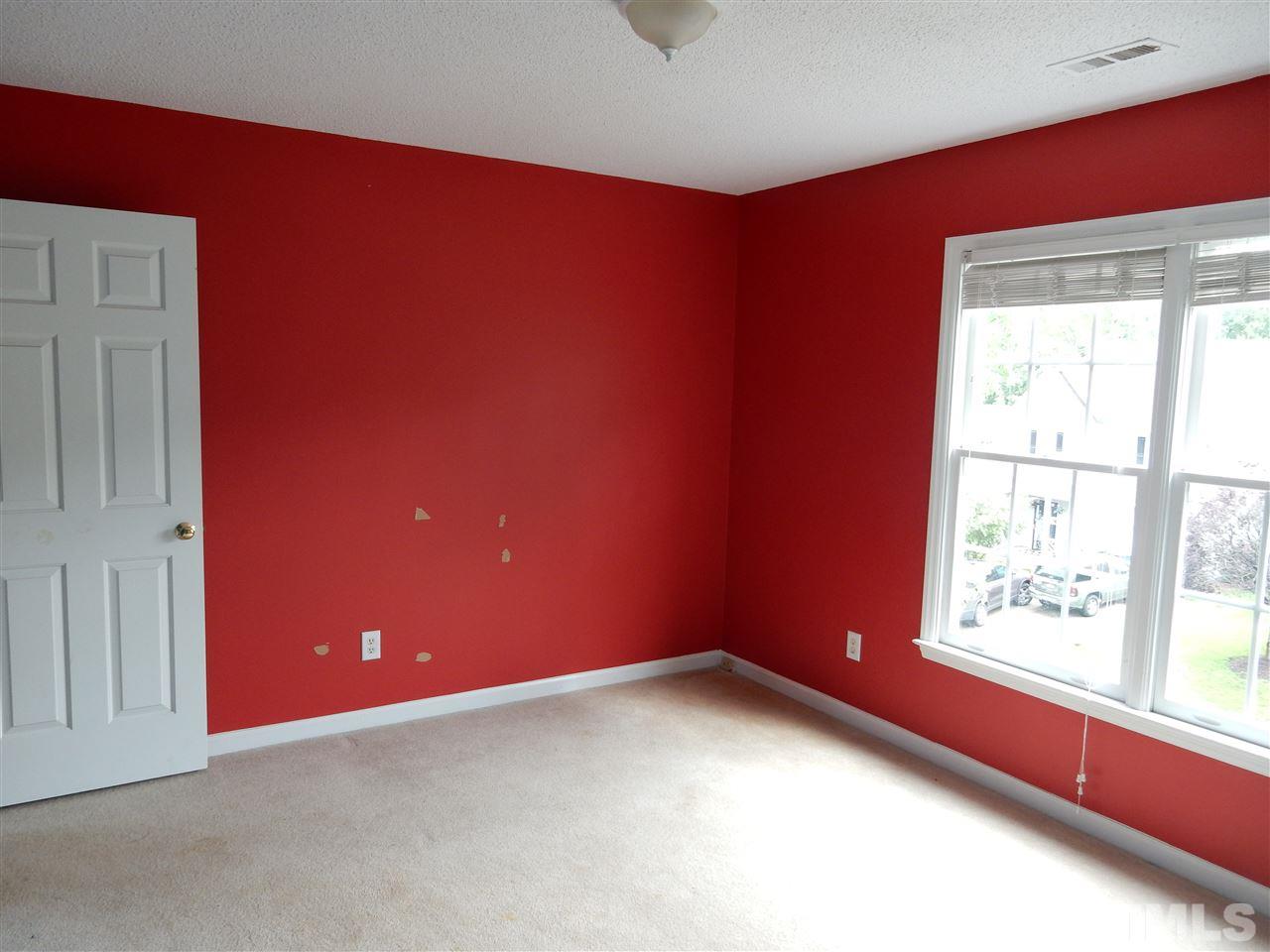 5313 Denmead Way Raleigh, NC 27613 - Photo 12 of 18 a view of an empty room with a window