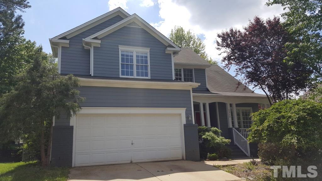 5313 Denmead Way Raleigh, NC 27613 - Photo 15 of 18 front view of house with a street