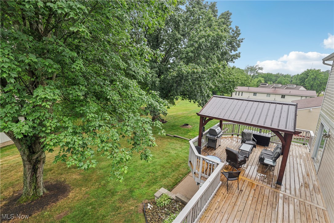 520 East Caston Road Uniontown, OH 44685 - Photo 41 of 47 View of the large back deck