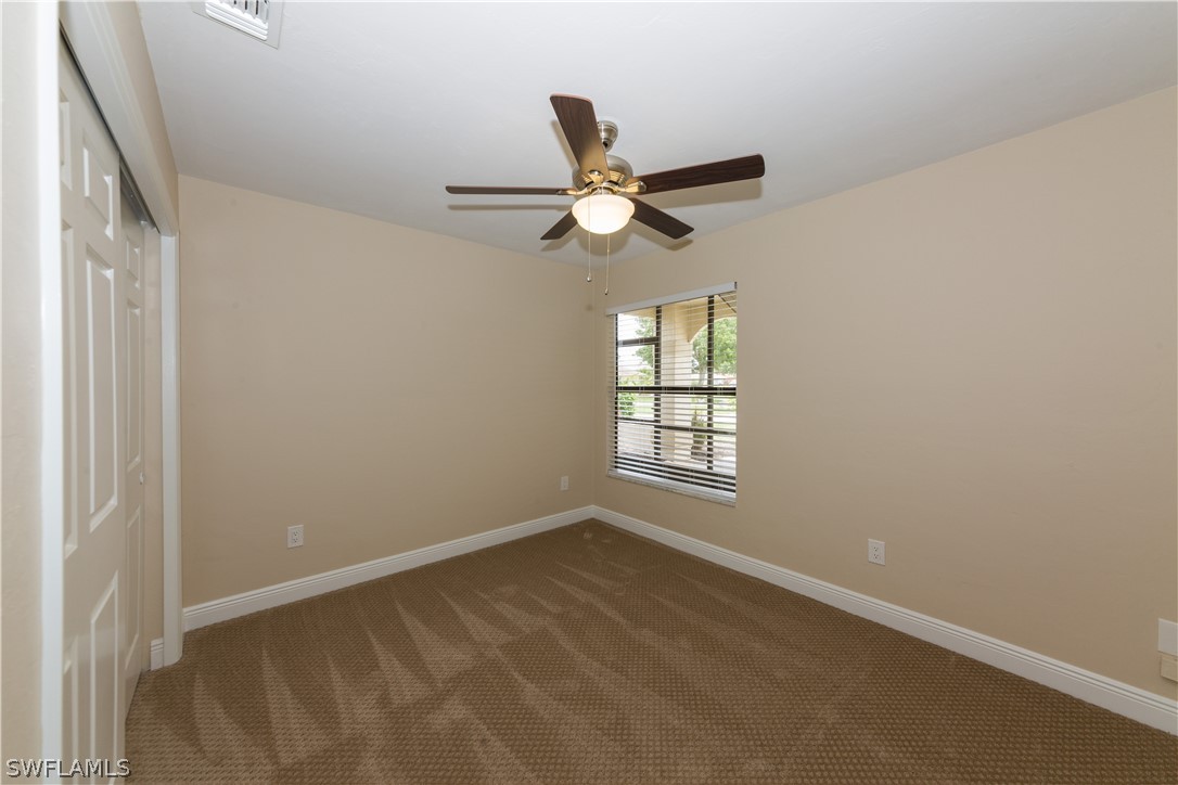 13258 Heather Ridge Loop Fort Myers, FL 33966 - Photo 16 of 22 a view of an empty room with a window