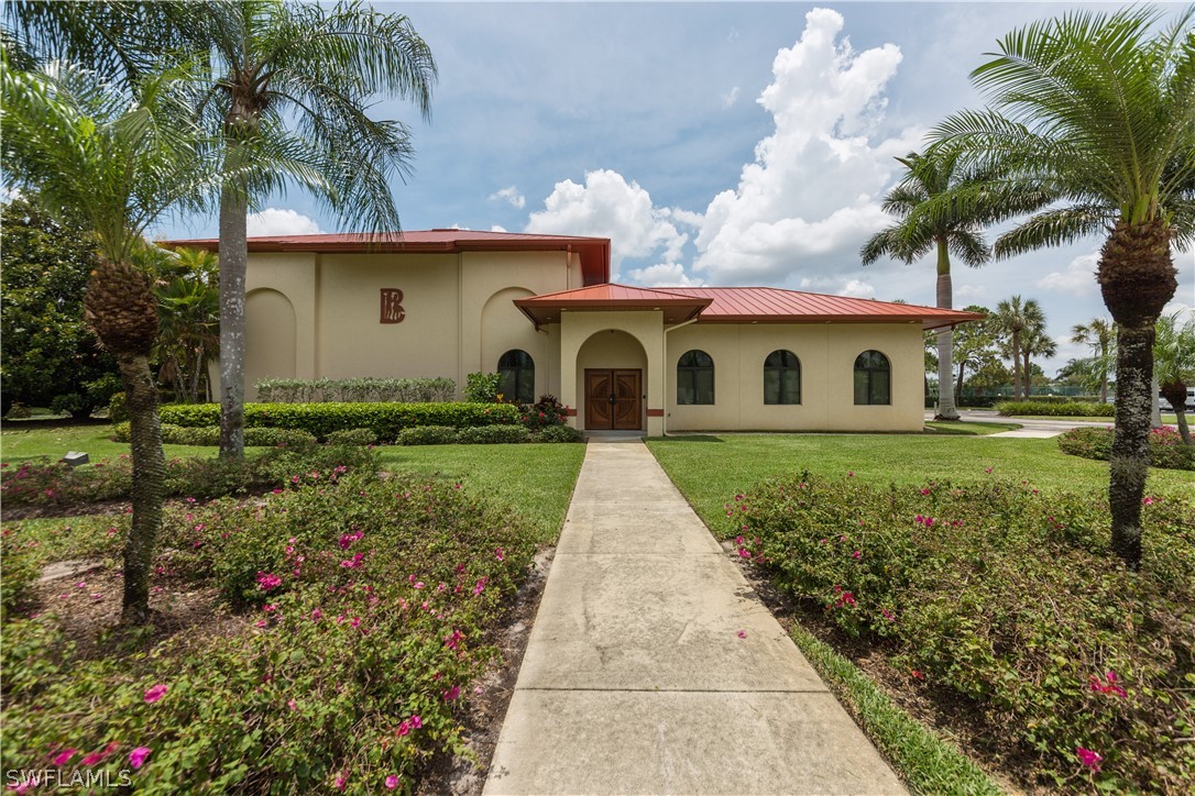 13258 Heather Ridge Loop Fort Myers, FL 33966 - Photo 22 of 22 a front view of a house with a yard and garage