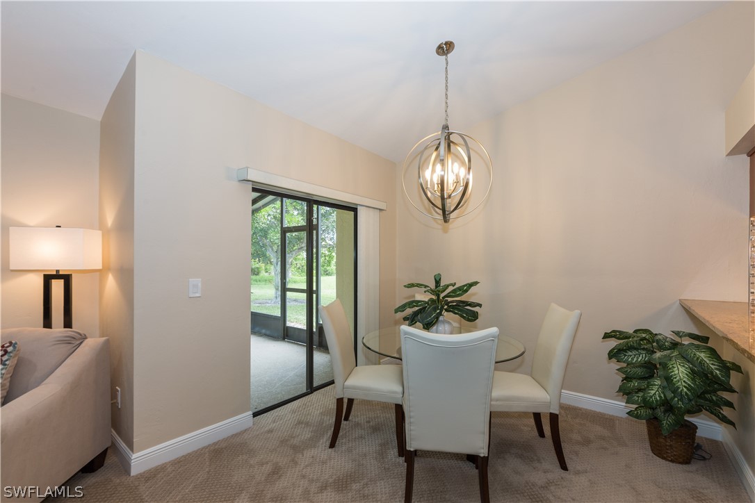 13258 Heather Ridge Loop Fort Myers, FL 33966 - Photo 10 of 22 a dining room with furniture and window