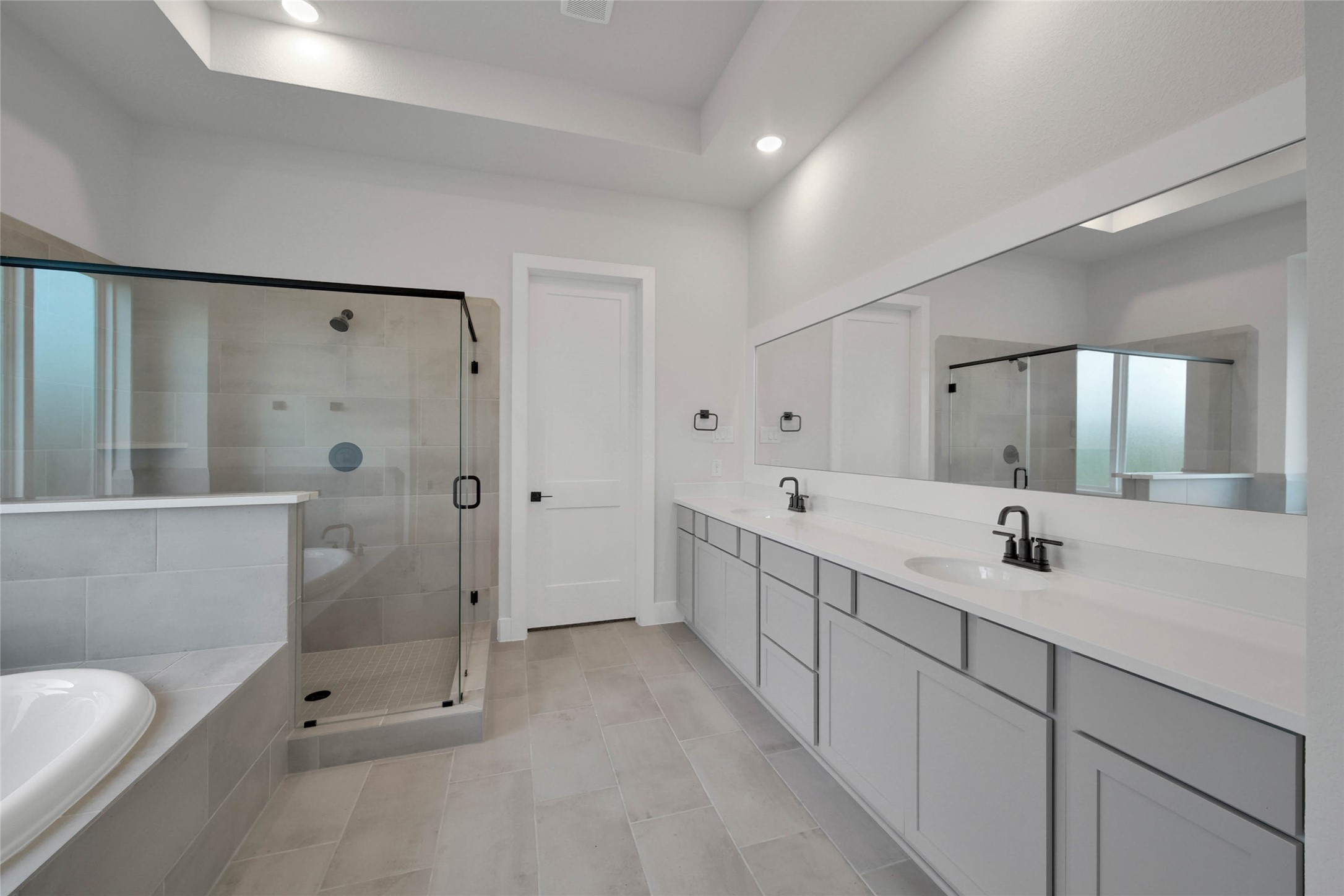 4610 Magnolia Bend Drive Rosharon, TX 77583 - Photo 21 of 48 a bathroom with a double vanity sink toilet and shower