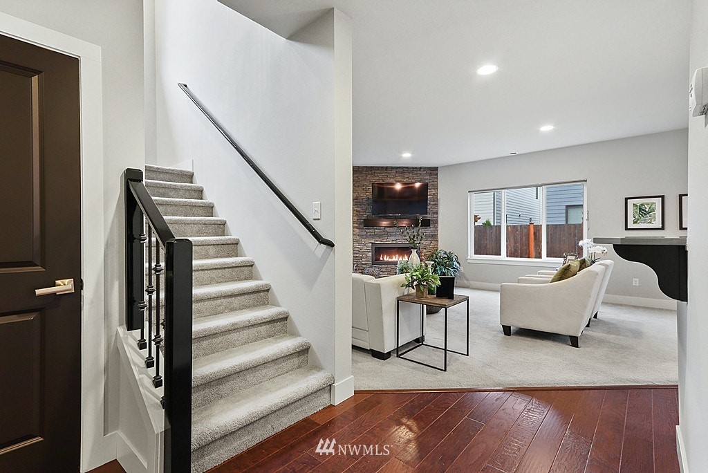 16808 1st Avenue West Bothell, WA 98012 - Photo 16 of 29 a living room with furniture and a wooden floor