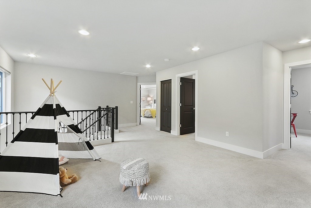 16808 1st Avenue West Bothell, WA 98012 - Photo 19 of 29 a view of a livingroom with furniture and a potted plant