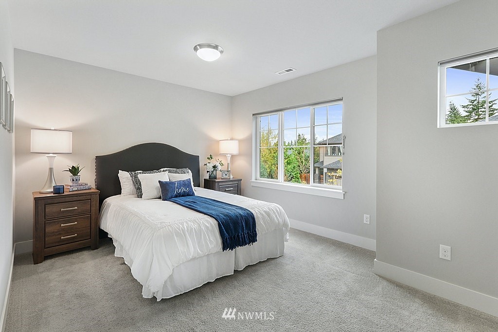 16808 1st Avenue West Bothell, WA 98012 - Photo 23 of 29 a bedroom with a bed and a window