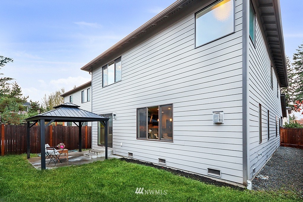 16808 1st Avenue West Bothell, WA 98012 - Photo 28 of 29 a view of a house with backyard and wooden fence