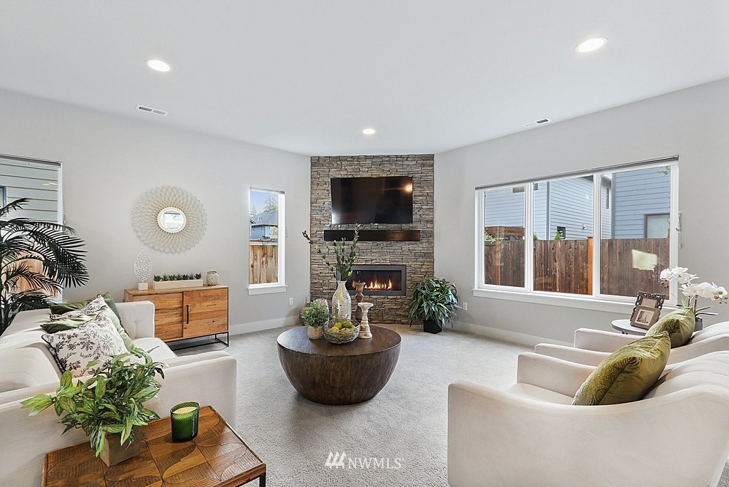 16808 1st Avenue West Bothell, WA 98012 - Photo 5 of 29 a living room with furniture and a flat screen tv