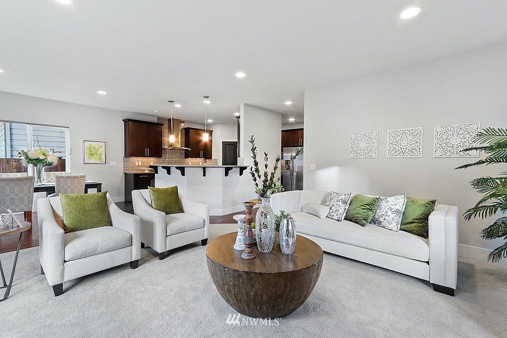16808 1st Avenue West Bothell, WA 98012 - Photo 7 of 29 a living room with furniture and a view of kitchen
