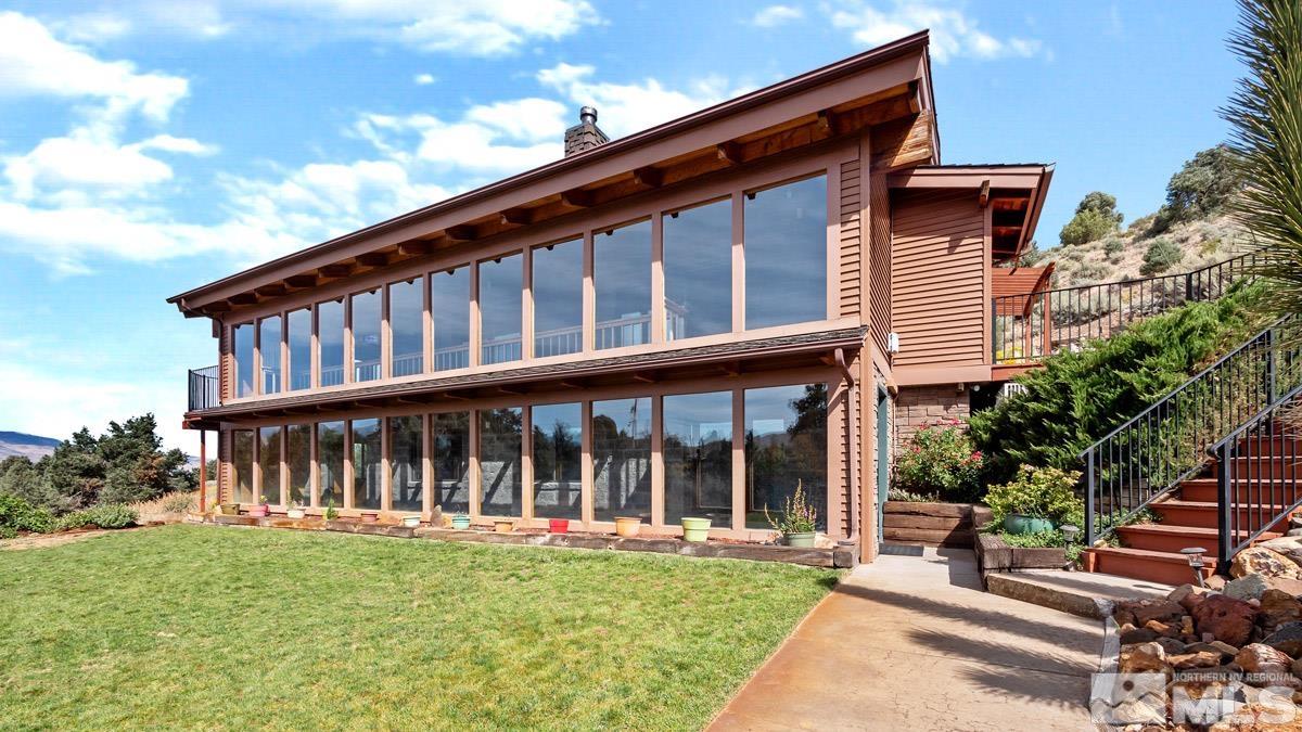 15866 Toll Road Reno, NV 89521 - Photo 1 of 29 front view of a house with a yard