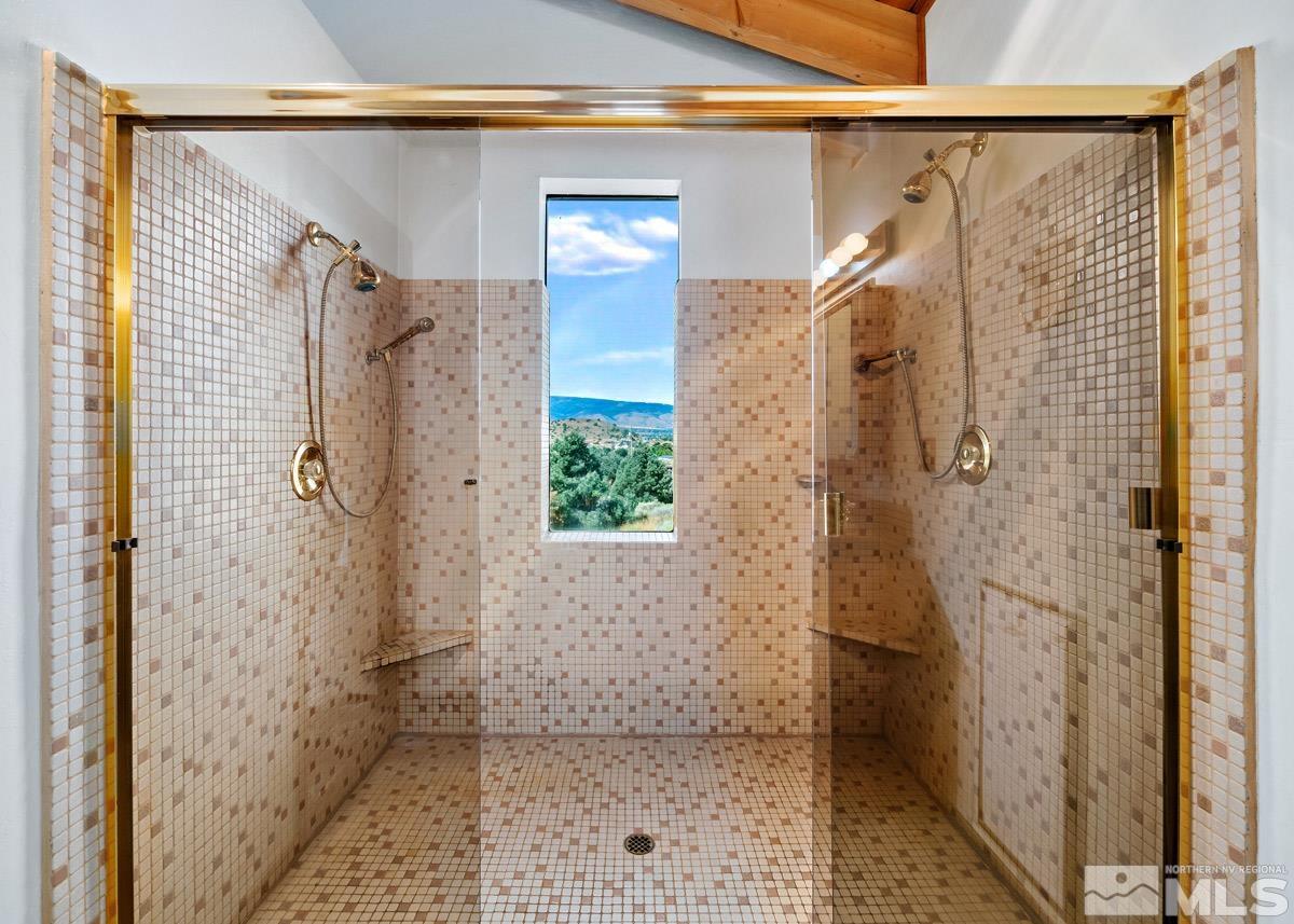 15866 Toll Road Reno, NV 89521 - Photo 13 of 29 a bathroom with a shower and a sink
