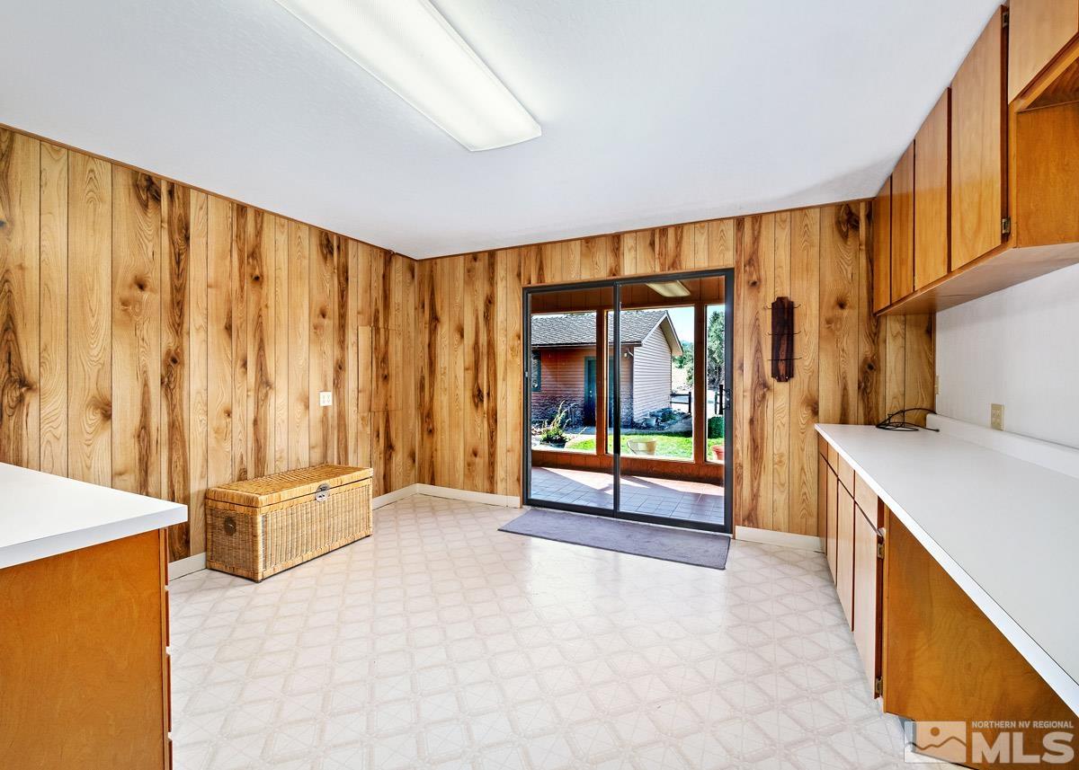 15866 Toll Road Reno, NV 89521 - Photo 15 of 29 a view of a kitchen with furniture and large windows