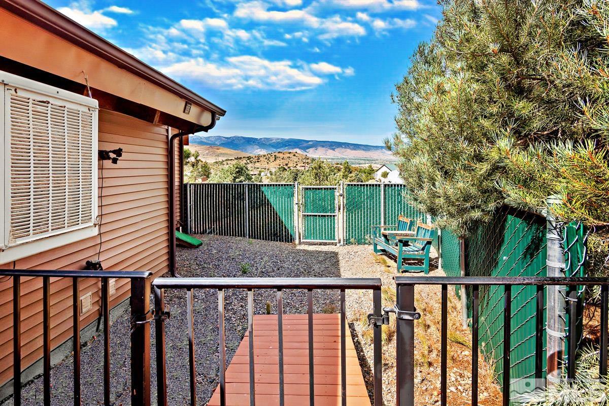 15866 Toll Road Reno, NV 89521 - Photo 24 of 29 a view of balcony with wooden floor and fence