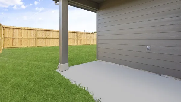 a view of backyard with outdoor space