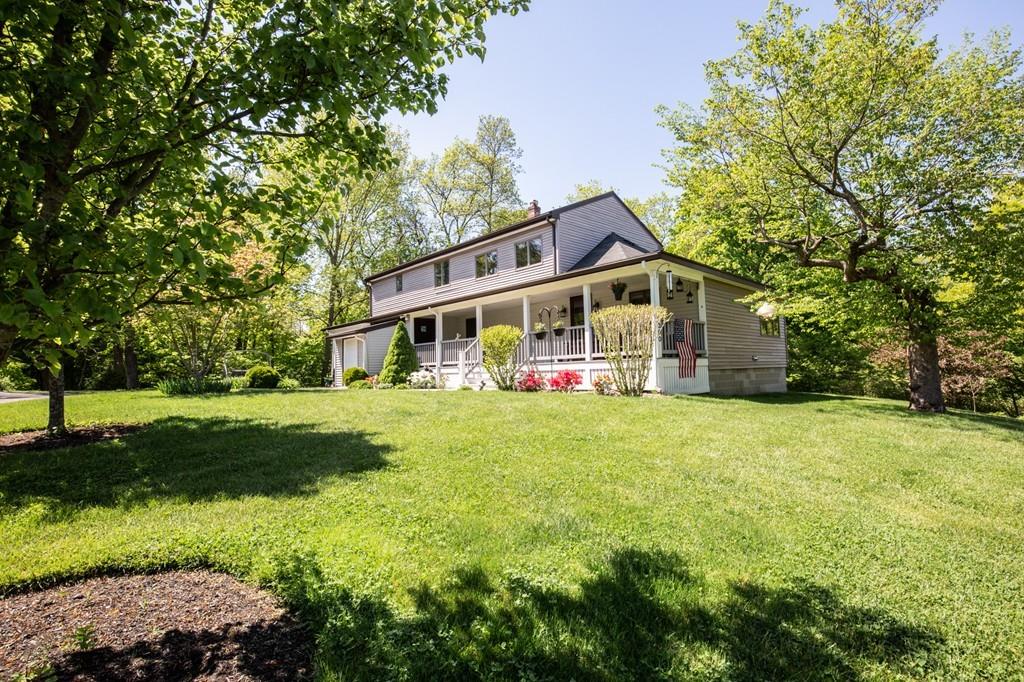 300 Locust Street Danvers, MA 01923 - Photo 1 of 41 a front view of house with yard and green space