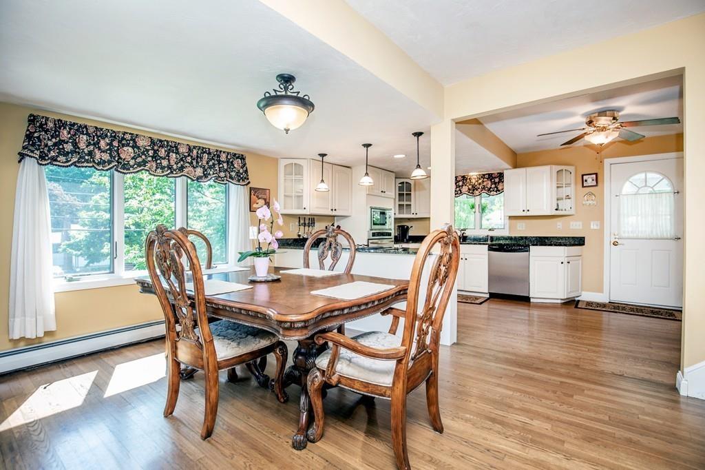 300 Locust Street Danvers, MA 01923 - Photo 15 of 41 a view of a dining room with furniture window and wooden floor