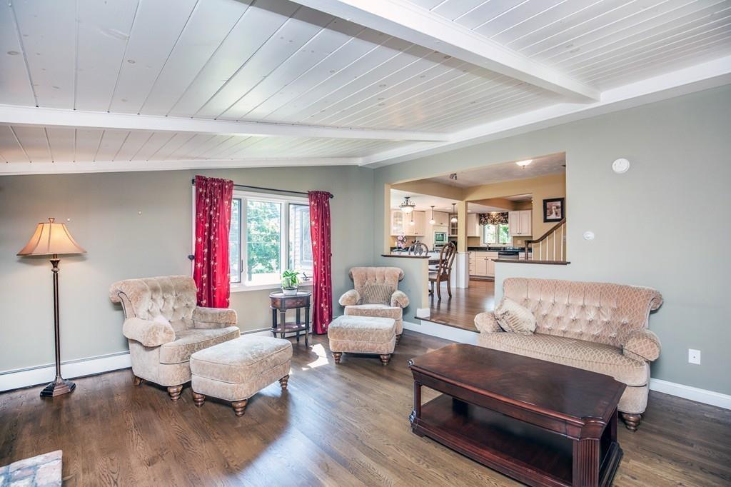 300 Locust Street Danvers, MA 01923 - Photo 16 of 41 a living room with furniture and wooden floor