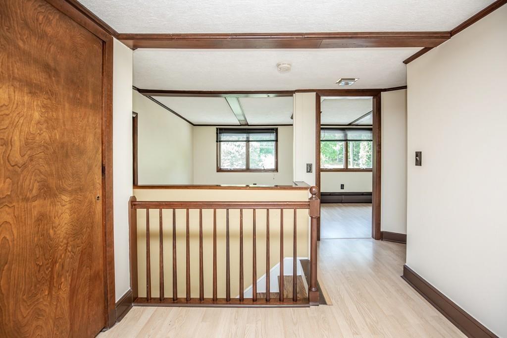 300 Locust Street Danvers, MA 01923 - Photo 23 of 41 a view of a room with wooden floor and a window