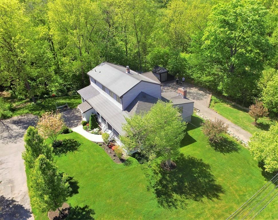 300 Locust Street Danvers, MA 01923 - Photo 5 of 41 an aerial view of a house with a yard