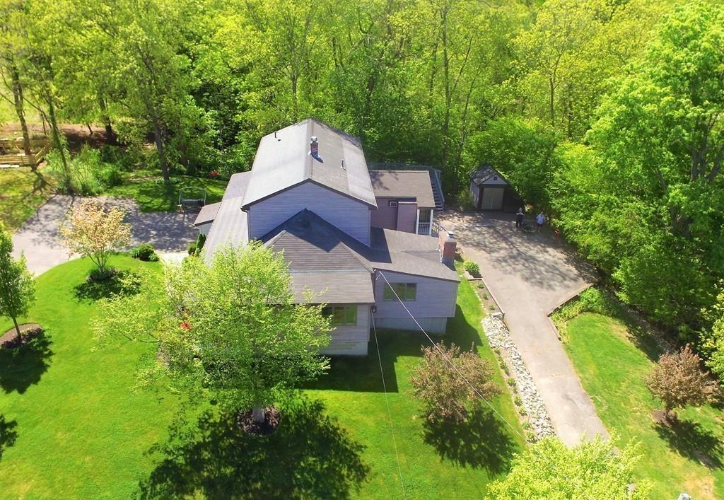 300 Locust Street Danvers, MA 01923 - Photo 9 of 41 an aerial view of a house with yard swimming pool and outdoor seating