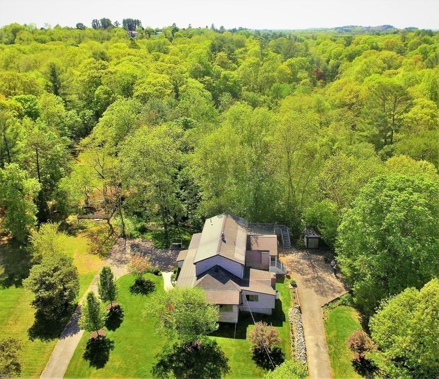 300 Locust Street Danvers, MA 01923 - Photo 10 of 41 an aerial view of a house with a yard