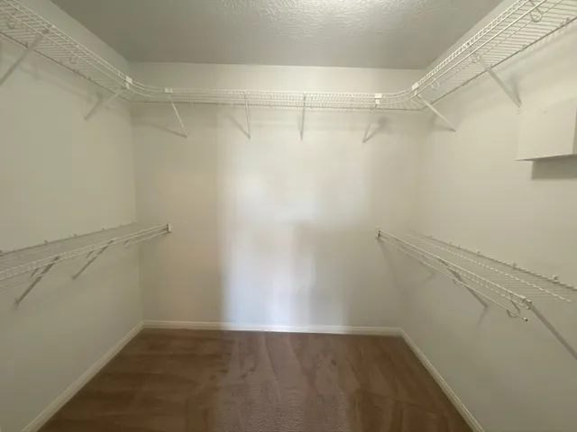 a view of a room with racks on the wall