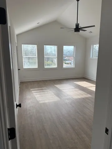an empty room with windows