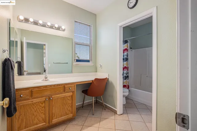 a view of a balcony with wooden floor